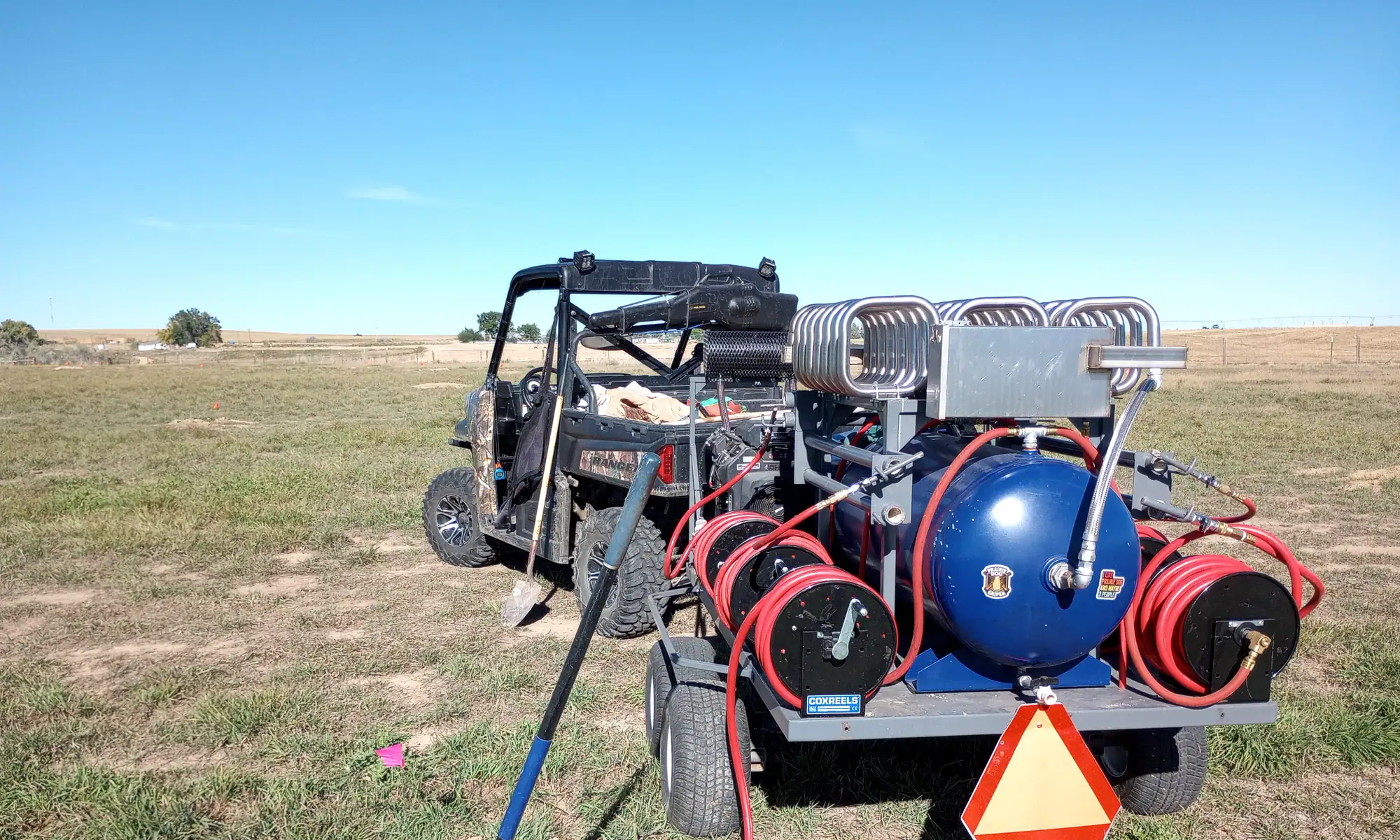 The Rodent Ranger’s PERC rig and hose reels on a prairie dog colony in Colorado