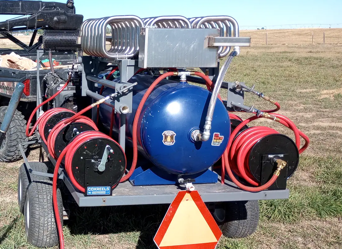 Hose reels and the pressure tank on The Rodent Ranger’s PERC trailer