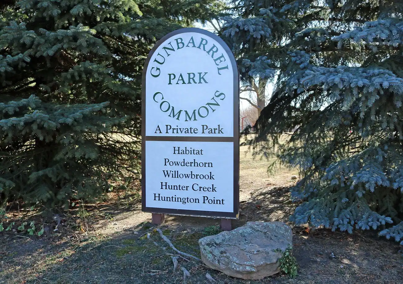 Gunbarrel Commons Park sign listing the Gunbarrel neighborhoods it serves